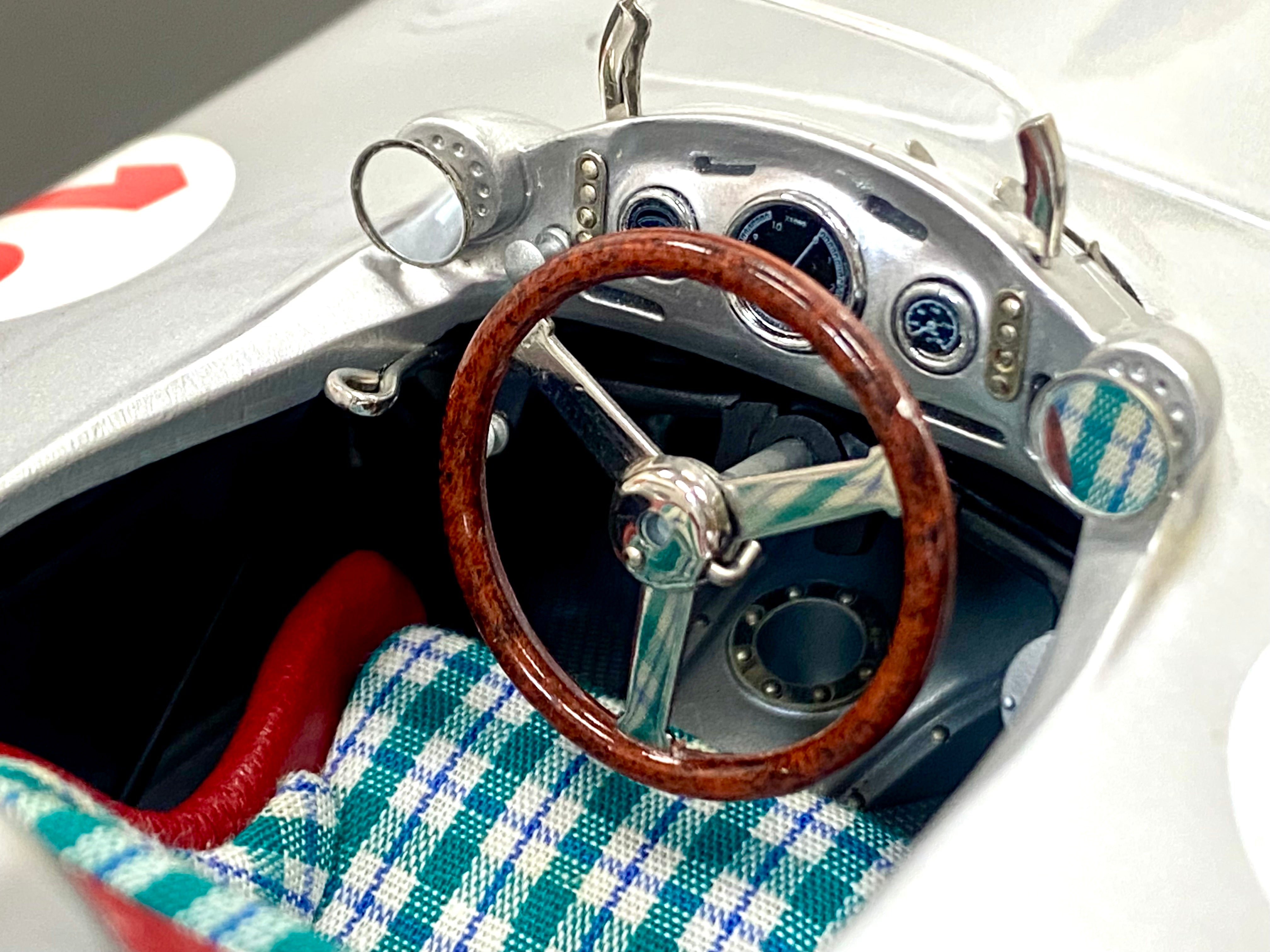 CMC M057 1:18 Mercedes W196 Streamliner #16 Stirling Moss signed plaque and case